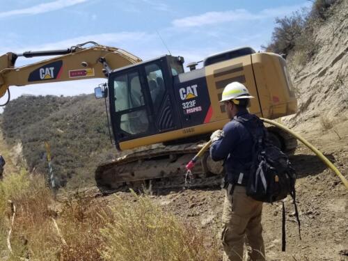 Fire watch during gas and oil pipeline repair.